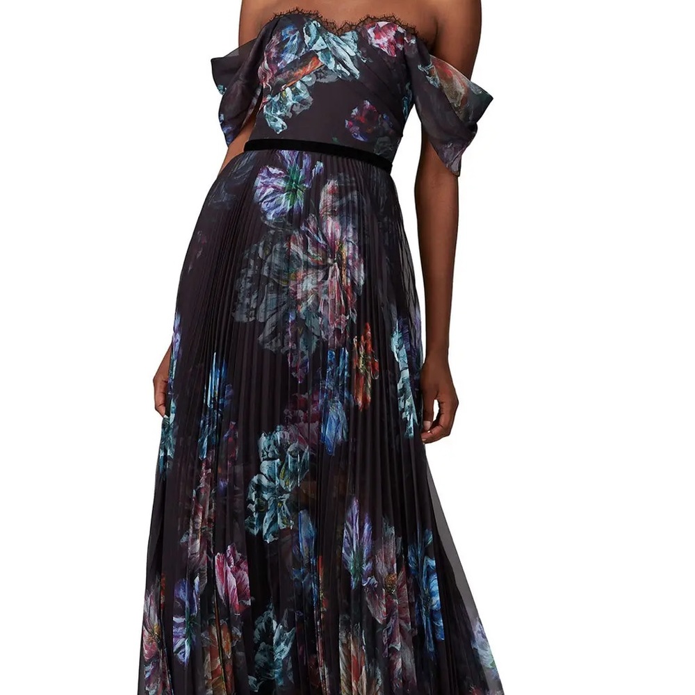 Beautiful black floral Marchesa NotteA-line gown. Fully lined. Boned bodice.